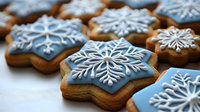 Festive star-shaped gingerbread cookies decorated with blue icing and white snowflake pattern. Winter holiday baking and traditional Christmas sweet treats.