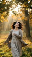 Happy young woman with dark wavy hair and fair complexion enjoying autumn season in park, wearing casual beige dress and cardigan, surrounded by golden foliage and sunlight.