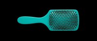 Teal paddle hair brush with black bristles, isolated on transparent background, ready for beauty, salon, and haircare designs, stickers, clipart, and print on demand use.