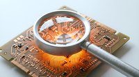 Magnifying glass examining detailed copper circuit board with electronic components and microchips for technology analysis and quality control inspection.