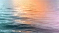 Tranquil ocean water surface with gentle ripples reflecting warm sunset colors in soft pink, orange and blue gradient tones for peaceful meditation backgrounds.