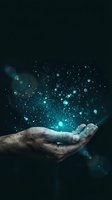 Male hand holding magical glowing particles and sparkles against dark background. Concept of innovation, technology, creativity and supernatural power.