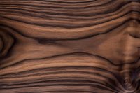 Rich brown wooden texture with natural wavy grain pattern and deep striations creates organic flowing lines across surface, suitable for furniture design backgrounds.