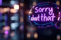 Glowing neon speech bubble with sorry about that text against blurred city lights background creates modern urban nightlife atmosphere with bokeh effect.