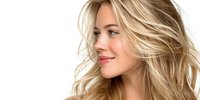 Young blonde woman with wavy hair smiling in profile against white background. Natural beauty portrait for skincare, haircare and wellness concepts.