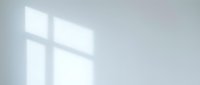 Window light shadow on white wall, minimalist interior design element for backgrounds and overlays.