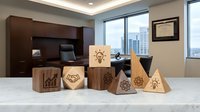 Wooden business concept blocks with icons on office desk representing strategy, teamwork, growth, innovation and leadership in corporate environment.