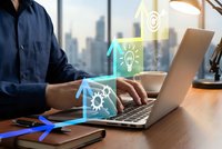 Business professional using laptop with digital innovation icons representing technology solutions and creative ideas in modern office environment.