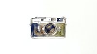 Vintage film camera with colorful watercolor effect isolated on white background, ready for design projects, photography blogs, and creative compositions.