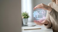 Woman holding glowing cloud storage icon between hands, representing digital data backup, file management, and online computing solutions for business.