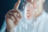 Business person interacting with digital bitcoin hologram, showcasing cryptocurrency technology and financial innovation in modern digital economy.