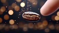 Macro shot of fresh roasted coffee bean falling onto metal spoon with golden bokeh lights in background, creating magical coffee moment for cafe advertising.