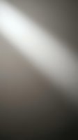 Abstract silver metallic surface with smooth gradient transitions and reflective light effects for modern design backgrounds.