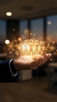 Businessman holding glowing neon team icon with golden light particles above palm in modern office setting at dusk, representing teamwork, collaboration, and business growth.