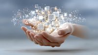 Female hands holding glowing digital squares and particles, representing technology innovation and digital transformation in business.