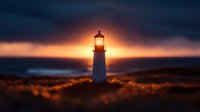 Lighthouse silhouette against dramatic sunset sky, glowing beacon light illuminates coastal landscape with warm orange backlight and dark moody clouds.