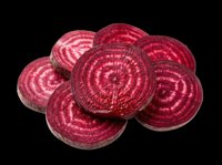 Fresh sliced beetroot rounds isolated on transparent background, ready for culinary design, recipe graphics, food packaging, print-on-demand products, and kitchen-themed digital projects.