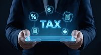Professional businessman holding tablet displaying digital tax management interface with financial icons for accounting and business planning services.