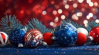 Festive arrangement of red and blue Christmas ornaments with spruce branches against blurred bokeh lights for holiday decorating.