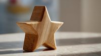 Wooden star shape decoration made from natural wood grain material standing on surface with soft lighting and blurred background for craft projects.