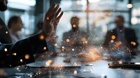 Professional team silhouettes in modern office with bokeh light effects and raised hand during business meeting, creating dynamic corporate atmosphere.