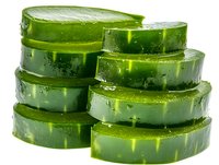 Fresh cucumber slices stacked showing crisp, juicy texture and vibrant green color on white background, ready for salads, garnishes and spa treatments.