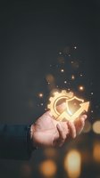 Hand holding glowing gear and arrow icon symbolizing business growth, innovation, and success. Suitable for corporate presentations, technology solutions, and strategic planning materials.