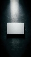 Blank white business card on dark scratched metal surface with dramatic spotlight illumination for corporate branding and professional design mockup.