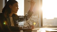 Young businesswoman analyzing financial data with digital growth charts and statistics overlay in modern office during golden hour sunlight.