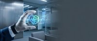 Businessman hand holding glowing digital brain symbol representing artificial intelligence, machine learning, and neural networks for technology innovation and data processing solutions.