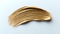 Golden metallic paint brush stroke on white background, luxury cosmetic smear texture isolated for creative design and makeup artistry applications.