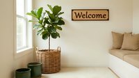 Cozy entryway with a fiddle leaf fig in a wicker basket, green pots, a welcome sign, and a neutral bench by a bright window.