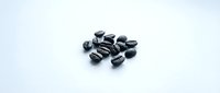 Black tourmaline raw crystals and mineral stones isolated on white background for wellness and healing purposes.