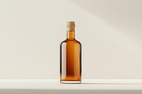Amber glass bottle with wooden cork stopper on white surface against neutral background, suitable for premium spirits or oils packaging.