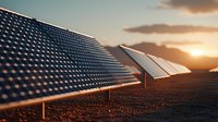 Solar panel array in desert landscape at golden sunset with dramatic sky, renewable energy installation capturing sunlight for sustainable power generation.