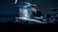 Female doctor examining patient with holographic medical scan display showing internal organs and cardiovascular system for healthcare, diagnosis, and futuristic medicine concepts.