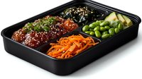 Asian cuisine poke bowl with glazed meat, edamame beans, carrots and avocado served in black plastic container for food delivery or takeout service.