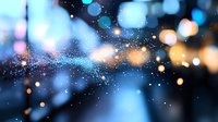 Abstract bokeh lights with sparkling particles and glowing orbs creating dreamy atmosphere for backgrounds, presentations, and digital designs.