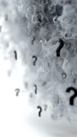 Question marks emerging through mysterious smoke on light background, creating atmospheric uncertainty and enigmatic mood for conceptual designs.