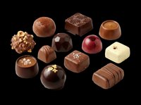Assorted chocolate candies and pralines isolated on transparent background, ready for culinary design, packaging, menus, print-on-demand products and digital food graphics.