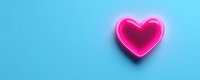 Glowing pink neon heart shape on vibrant blue background with copy space. Modern minimal love concept for Valentine's day and romantic designs.