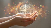 Hand holding glowing brain icon with golden light particles, representing intelligence, knowledge, innovation, and creative thinking for business and technology concepts.