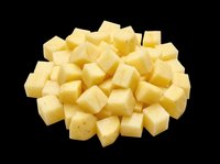 Diced potatoes isolated on transparent background, ready for culinary design, recipe graphics, food packaging, cooking blogs, restaurant menus, and print-on-demand kitchen products.