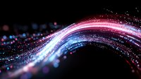 Glowing pink and blue light trail with sparkling particles flowing in curved motion against dark background creates magical atmosphere and energy effect.
