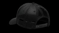 Black trucker mesh snapback cap rear view, isolated on transparent background, ready for t-shirt design, print on demand, stickers, sublimation, and clipart use.