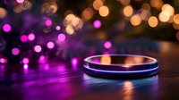 Glowing smart speaker device on dark surface with purple and orange bokeh lights creating magical atmosphere. Modern technology concept.