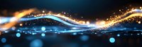 Glowing magical wave with sparkling light trails and bokeh effects on dark blue background, abstract energy flow motion design element.