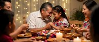 Multi-generational Hispanic family enjoying traditional dinner together with warm lighting and festive atmosphere creating memorable bonding moments.
