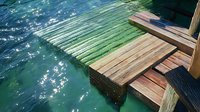 Wooden dock steps descending to sparkling turquoise water on sunny day, reflective surface creates mesmerizing pattern of light and shadow on gentle waves.