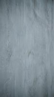 Gray concrete wall texture with weathered surface and natural aging patterns for industrial design backgrounds.